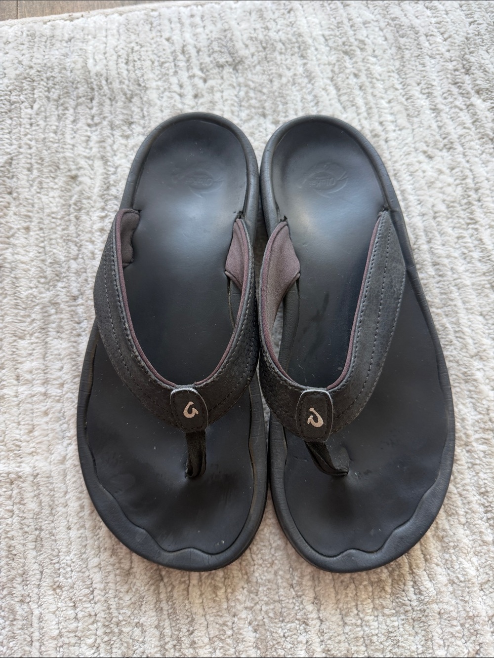 OluKai black water proof flip flops